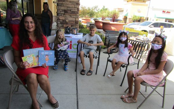 Mayor Bobbie Singh-Allen Reads To Kids At A Seat At The Table Books Pop-Up