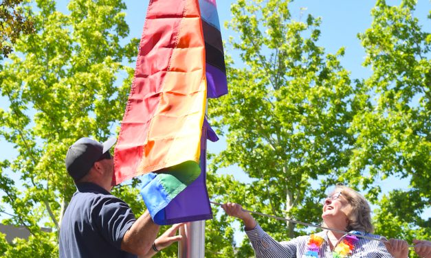 City Officials Raise Progressive Pride Flag at City Hall